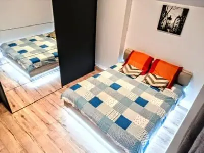 Un ou plusieurs lits dans un hébergement de l'établissement La chambre des petits voyageurs