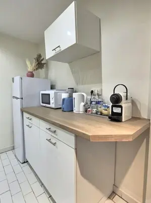 Cuisine ou kitchenette dans l'établissement Côté Cour de Miss K
