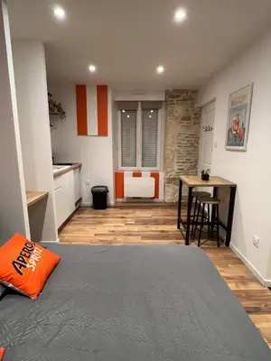 Un ou plusieurs lits dans un hébergement de l'établissement Le Spritz
