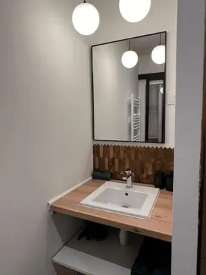 Salle de bains dans l'établissement Le Spritz