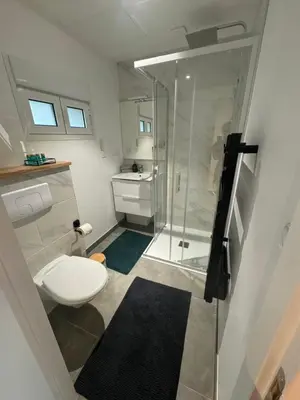 Salle de bains dans l'établissement Logust