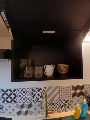 Cuisine ou kitchenette dans l'établissement Studio 20m2 - stationnement gratuit - WiFi