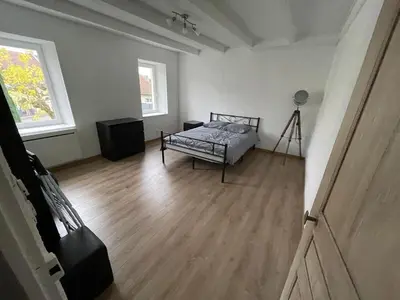 Un ou plusieurs lits dans un hébergement de l'établissement Appartement 3 chambres climatisé 100m2
