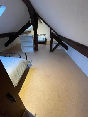 Un ou plusieurs lits dans un hébergement de l'établissement Appartement 3 chambres climatisé 100m2