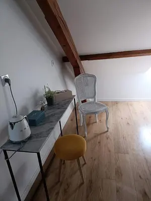 Coin salon dans l'établissement Nid de charme pour soirée romantique