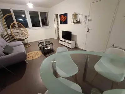 Coin salon dans l'établissement Appartement 3 chambres - Drapeau