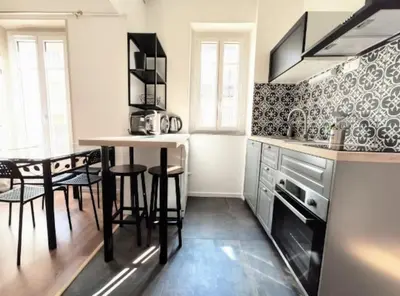 Cuisine ou kitchenette dans l'établissement Logement de charme proche centre-ville - TV - WiFi