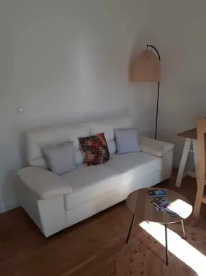 Coin salon dans l'établissement Appartement 2 personnes - fibre