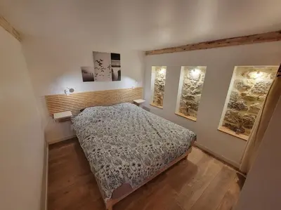 Un ou plusieurs lits dans un hébergement de l'établissement Le gîte du Verger - Appartement à Arc et Senans