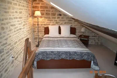 Un ou plusieurs lits dans un hébergement de l'établissement B&B Chez Marie