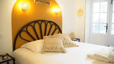Un ou plusieurs lits dans un hébergement de l'établissement Gîte Du Pré Pommier - Clim - Piscine - Sauna