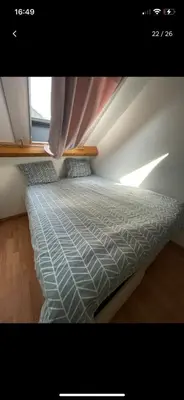 Un ou plusieurs lits dans un hébergement de l'établissement Maison 15 minutes de Dijon Marsannay