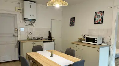 Cuisine ou kitchenette dans l'établissement L'écrin Autunois