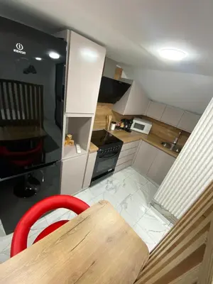 Cuisine ou kitchenette dans l'établissement Studio Moderne et Parking gratuit