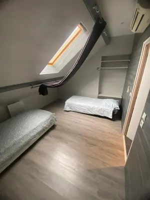 Un ou plusieurs lits dans un hébergement de l'établissement Logement fenay 15 minutes de Dijon