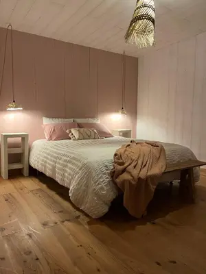 Un ou plusieurs lits dans un hébergement de l'établissement Au Chalet Bourguignon 4
