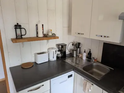 Cuisine ou kitchenette dans l'établissement Au Chalet Bourguignon 4