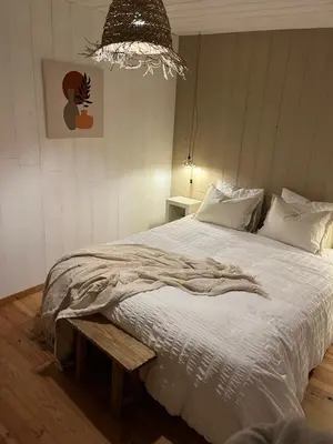Un ou plusieurs lits dans un hébergement de l'établissement Au Chalet Bourguignon 4