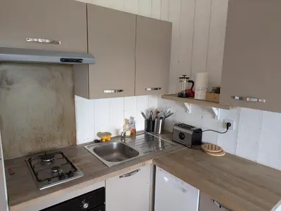 Cuisine ou kitchenette dans l'établissement Au Chalet Bourguignon 5