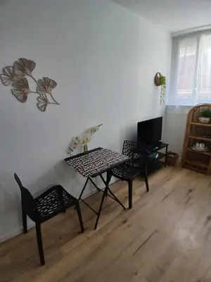 Coin salon dans l'établissement Comfortable studio pour 2 personnes