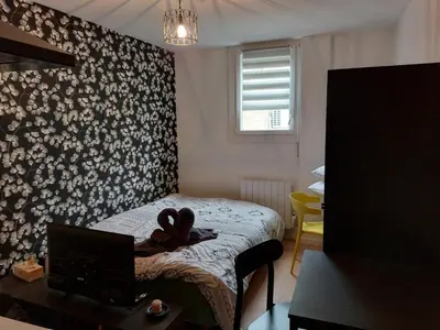 Un ou plusieurs lits dans un hébergement de l'établissement Beau studio - 1 personne