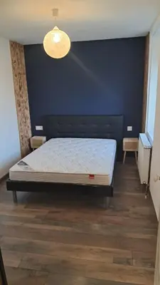Un ou plusieurs lits dans un hébergement de l'établissement Appartement 2 à 4 personnes à la campagne