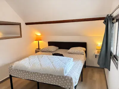 Un ou plusieurs lits dans un hébergement de l'établissement T2 23m2 Confort calme Centre ville Paray app 408