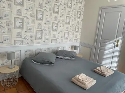 Un ou plusieurs lits dans un hébergement de l'établissement Gîte de l 'Angeline