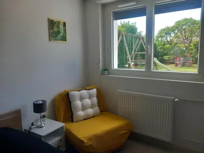 Coin salon dans l'établissement Le petit Appartement