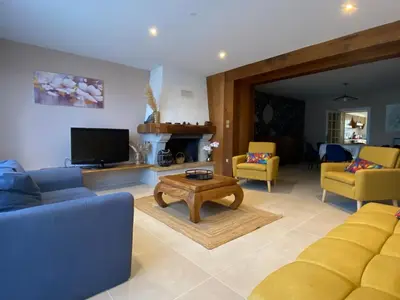 Télévision ou salle de divertissement dans l'établissement Au coeur de la Vallée Jura