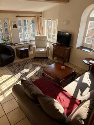 Télévision ou salle de divertissement dans l'établissement Les Rives de l'Armançon