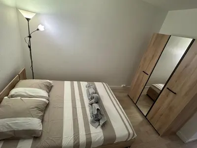 Un ou plusieurs lits dans un hébergement de l'établissement Appartement Cosy