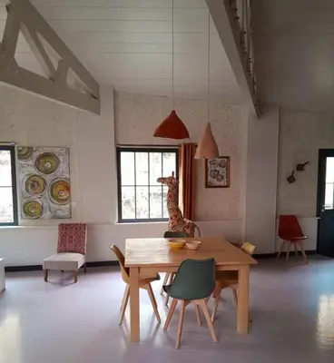 Coin salon dans l'établissement Holiday Loft 58