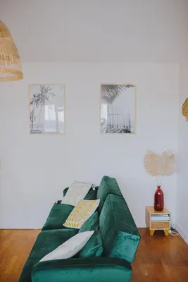 Coin salon dans l'établissement Le Côte Ouest - 2 Bedroom Apartment with Garage