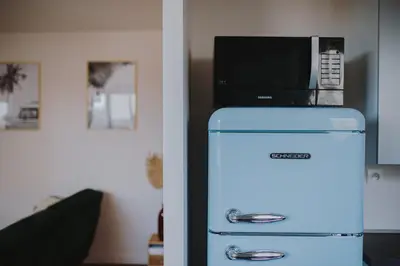 Télévision ou salle de divertissement dans l'établissement Le Côte Ouest - 2 Bedroom Apartment with Garage