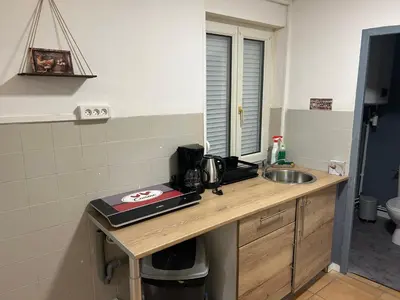 Cuisine ou kitchenette dans l'établissement L attrape rêves