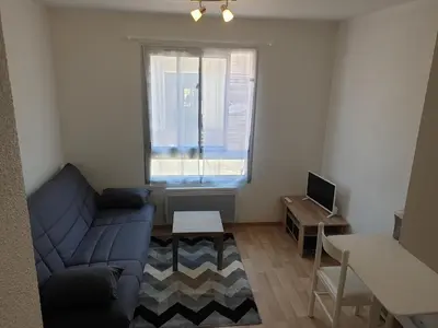Coin salon dans l'établissement Studio meublé centre ville Paray 1B16