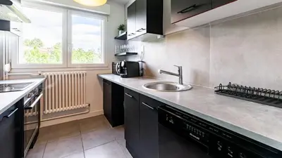 Cuisine ou kitchenette dans l'établissement Lumina - Spacieux & comfortable