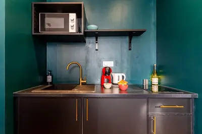 Cuisine ou kitchenette dans l'établissement Le Clos Épicurien - Voyage a Dijon