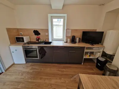 Cuisine ou kitchenette dans l'établissement Appartement atypique au cœur de Gray