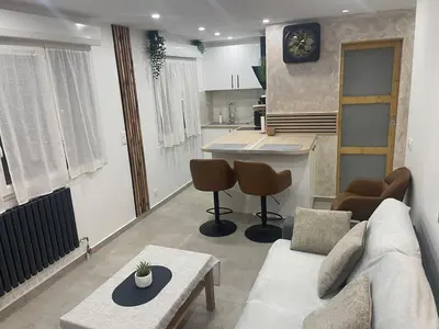 Cuisine ou kitchenette dans l'établissement Chouette Appartement 21