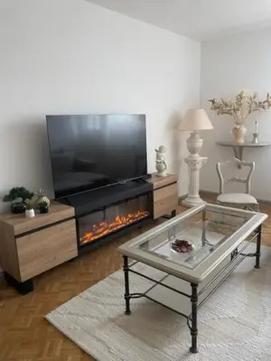 Télévision ou salle de divertissement dans l'établissement Le cosy Tournusien