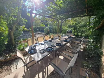 Jardin de l'établissement Ferme spacieuse climatisée, SPA & Pétanque