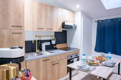 Cuisine ou kitchenette dans l'établissement Au 7ème Art Cinéma Room