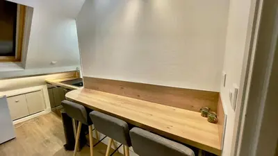 Cuisine ou kitchenette dans l'établissement Le Chablis - Proche Centre & CHU, avec MiniBar
