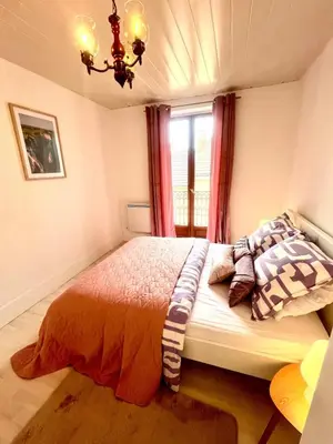Un ou plusieurs lits dans un hébergement de l'établissement Appartement en plein centre-ville Gare Darcy