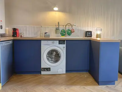 Cuisine ou kitchenette dans l'établissement Le Studio Madeleine