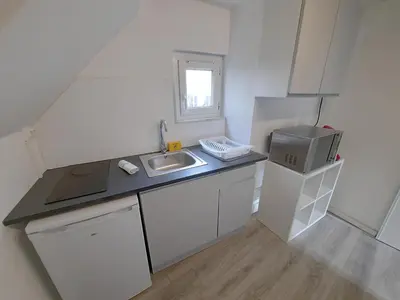 Cuisine ou kitchenette dans l'établissement Le Perdrix 2 - Studio 2 prs, proche centre ville