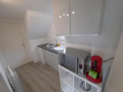 Cuisine ou kitchenette dans l'établissement Le Perdrix 2 - Studio 2 prs, proche centre ville