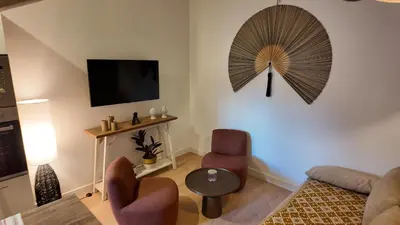 Télévision ou salle de divertissement dans l'établissement Dijon Hypercentre - Loge Pompon